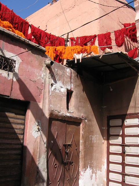 dyed yarn drying in the sun in morocco via chimblysweep on flickr