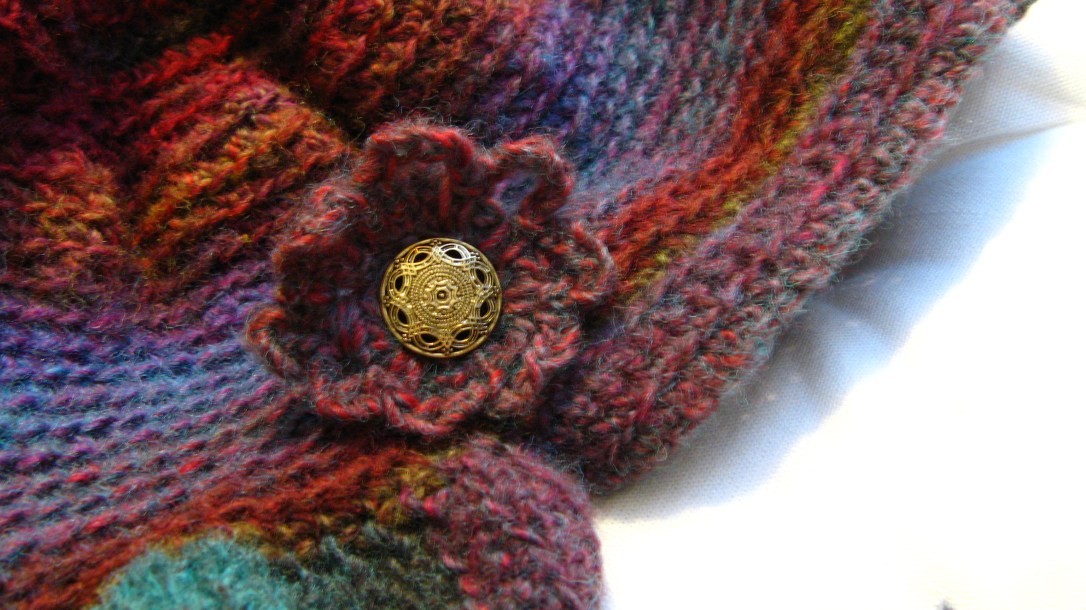 thrifted button on handmade crochet hat - freeform orignal pattern from lion brand yarn amazing ruby