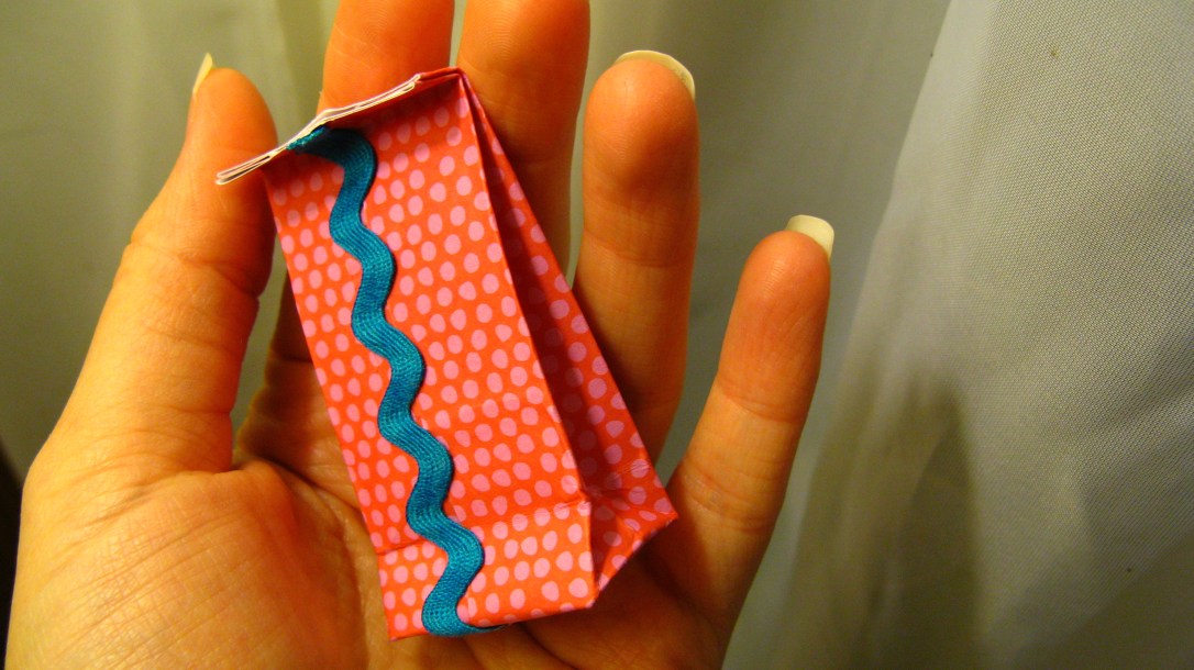 teeny tiny gift bag from tutorial - made from scrap of paper and vintage rickrack