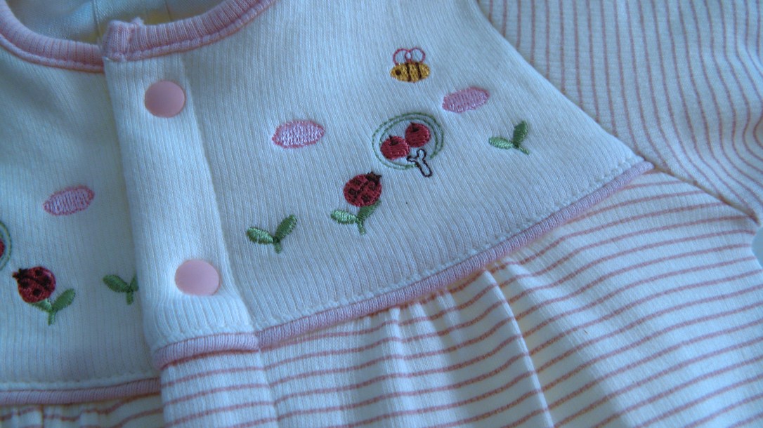 close-up macro photo of detail on japanese baby girl outfit