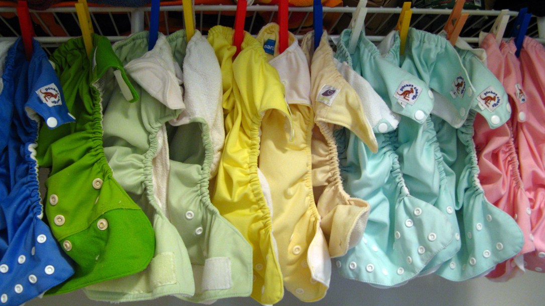 hanging pocket cloth diaper covers in assorted colors