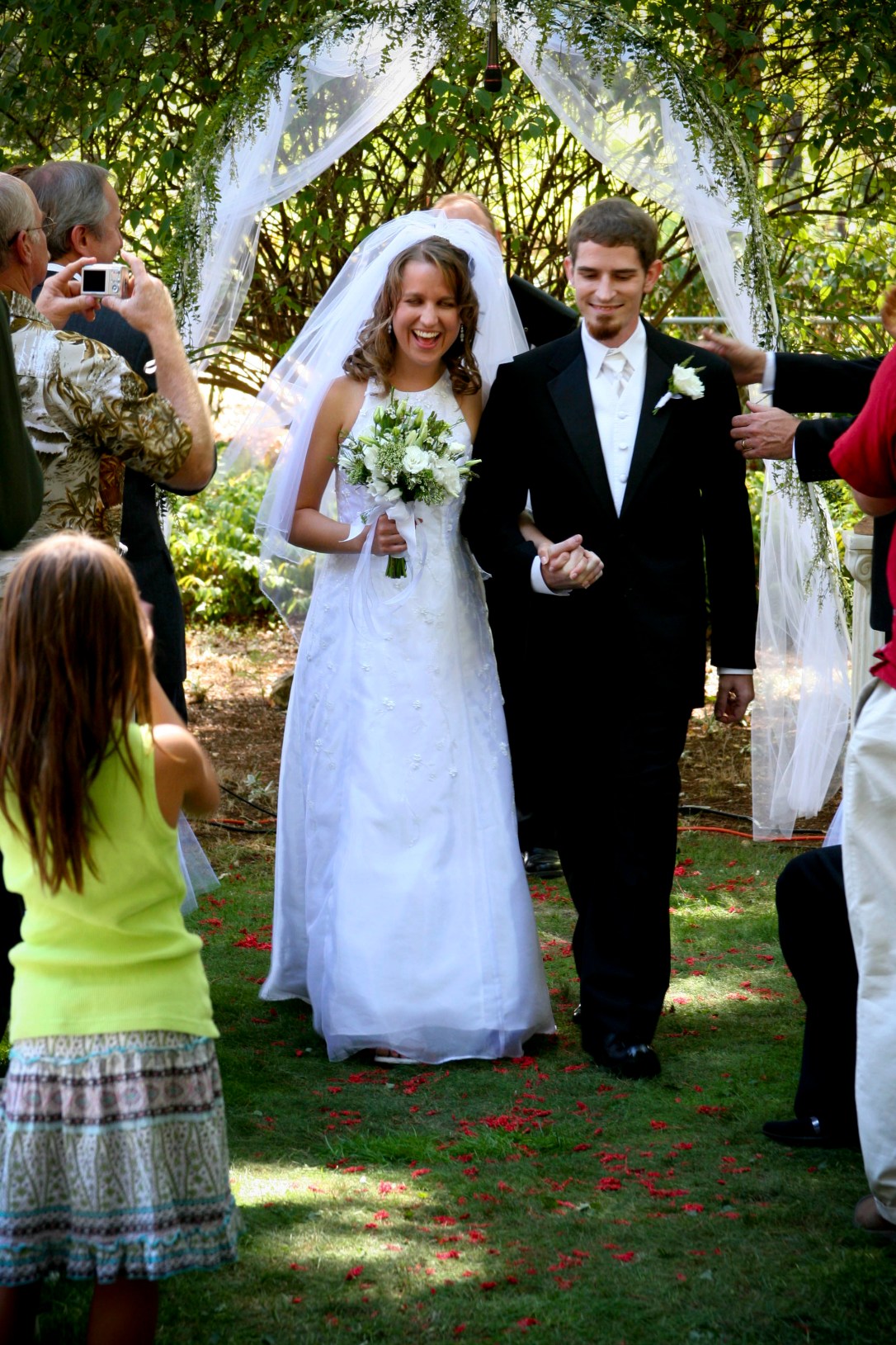 Recessional  - Dried red milo berries on grass