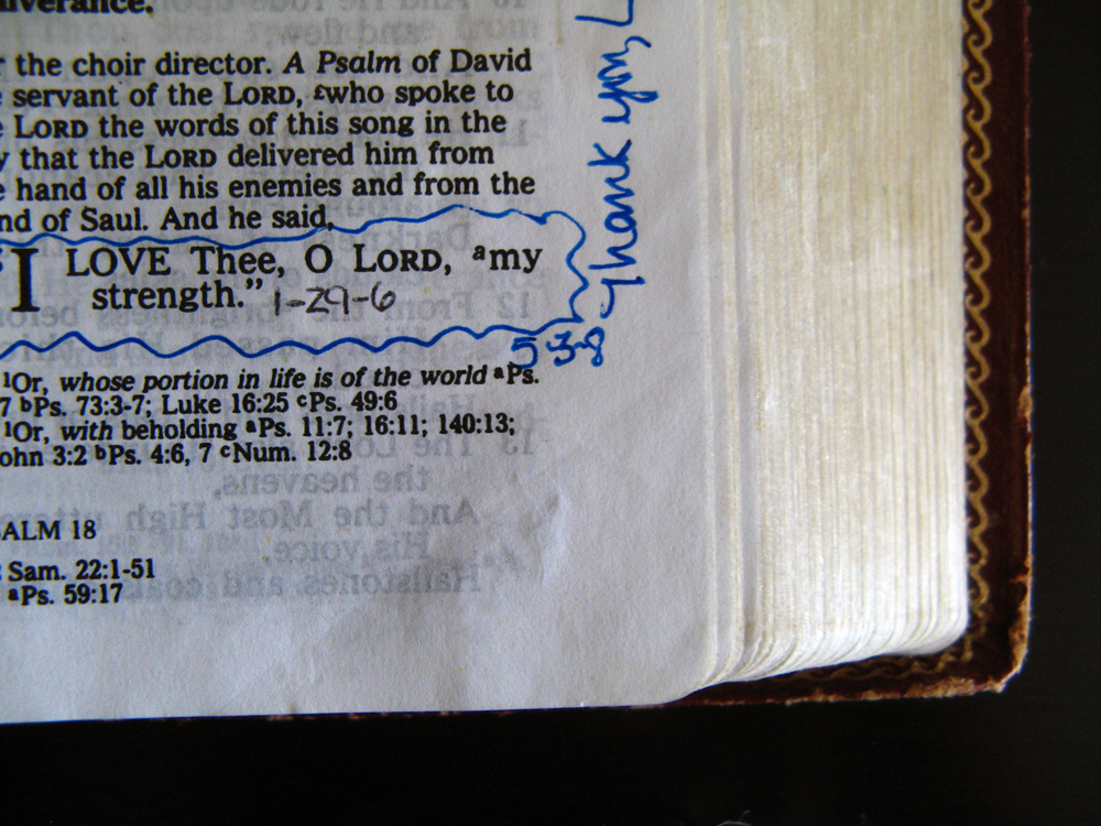 corner of bible on black