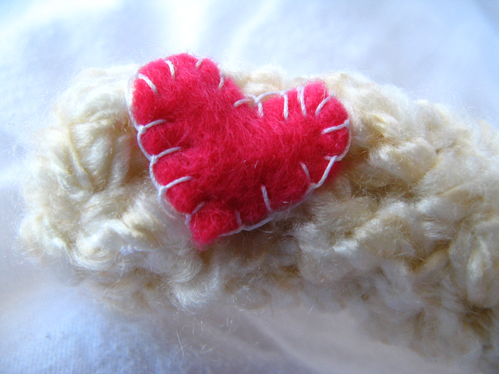 Kawaii Plush Creature - Blanket Stitch Pink Felt Heart on Crocheted Palm