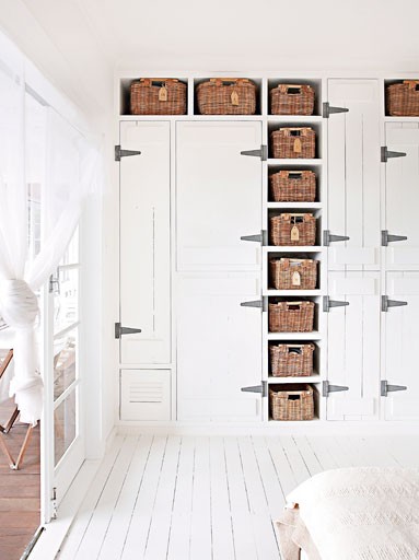 Australian House and Garden - White on white interior - Oversize Hinges on Closet - Wicker Baskets