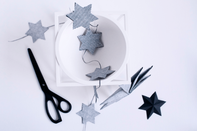 Make a paper star garland via the Cherry Blossom Blog