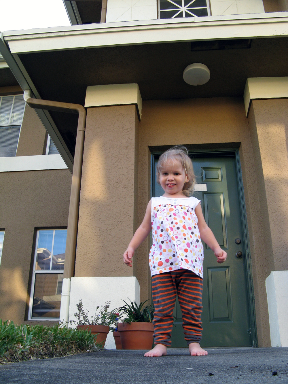 Toddler after dumping over potted plant