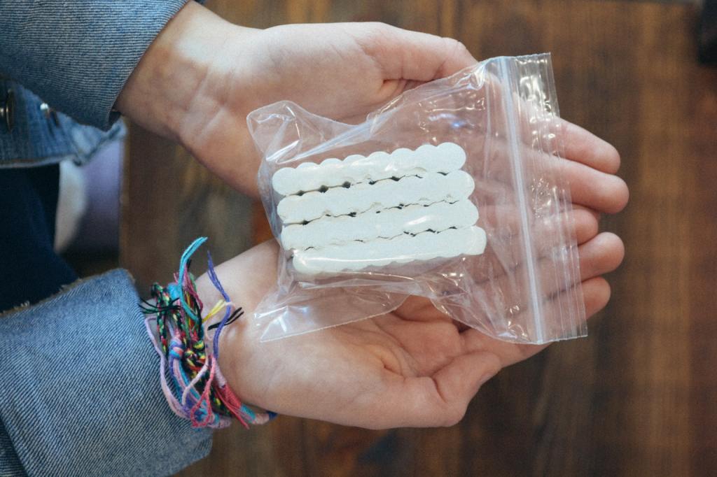 A student holds clay included in the Hands-on History box from Sonlight