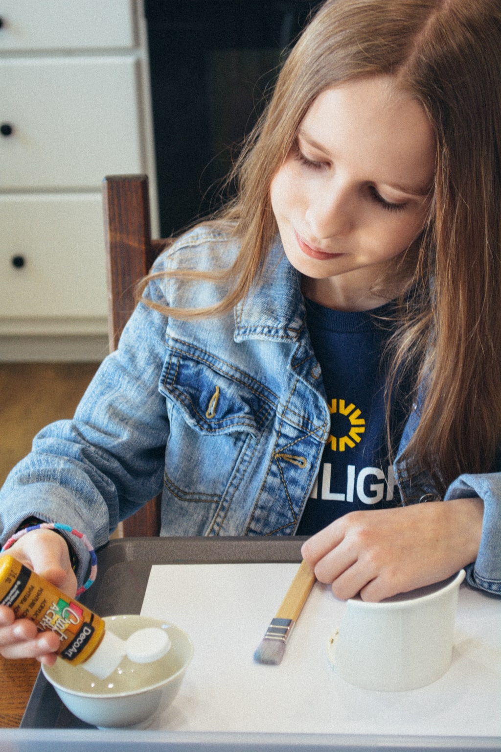 A student prepares craft supplies from a project in Sonlight's Hands-on History project box